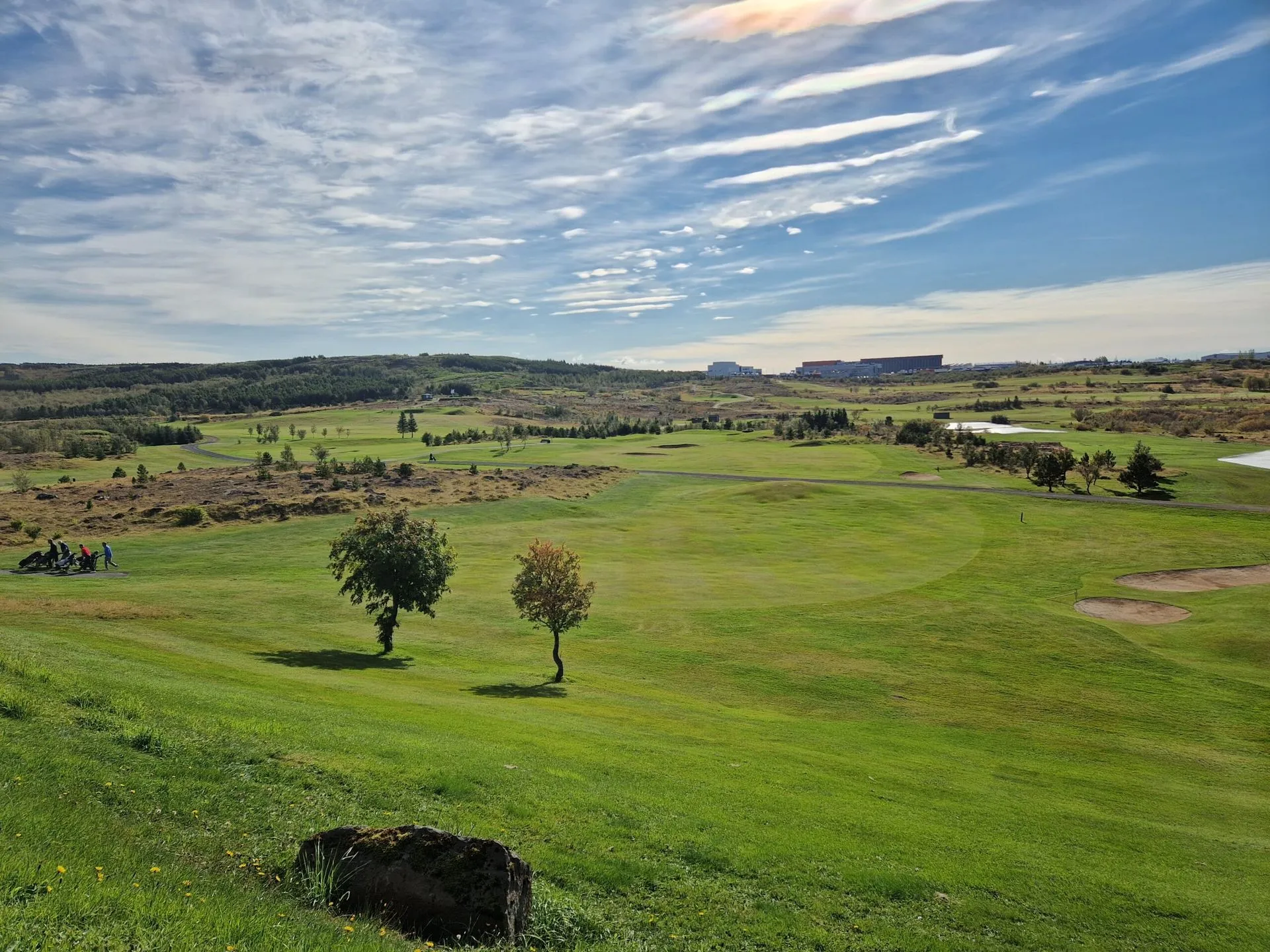 Fairway lined with trees at Grafarholt Golf Course