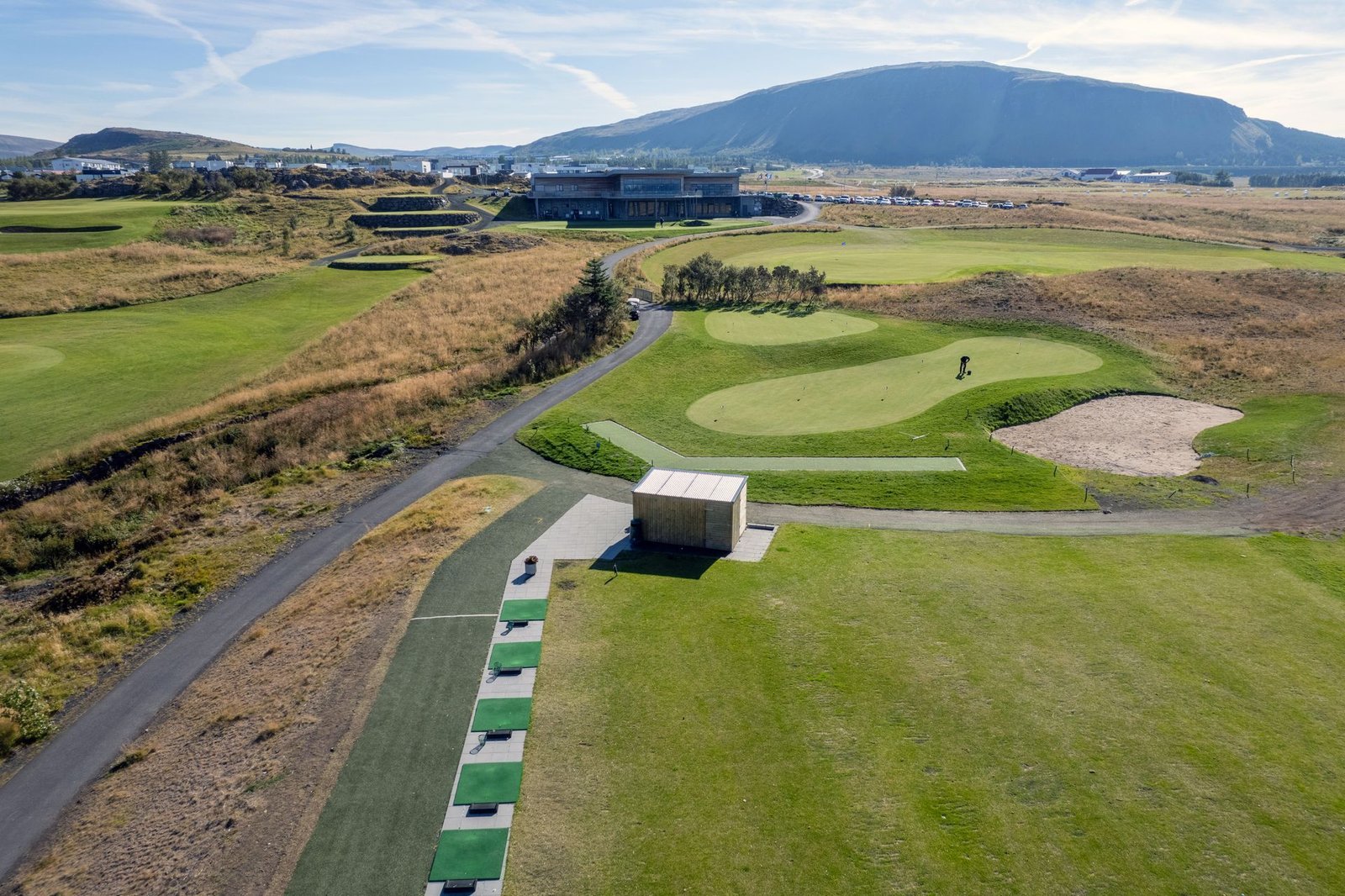 Driving range and putting green at the Klettur clubhouse